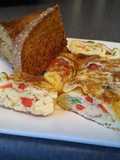 Receta de tortilla enrollada con hierbas, cebolla y pimiento