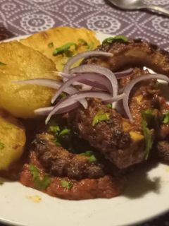 Una foto de Pulpo “a la parrilla” pero en sartén…