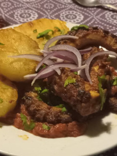 Una foto de Pulpo “a la parrilla” pero en sartén…