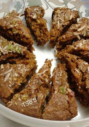 A picture of Flax seed oatmeal wheat coconut jaggery cake in Pressure cooker.