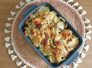 A picture of button mushrooms with potatoes