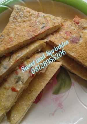 A picture of Bread in egg sandwich.