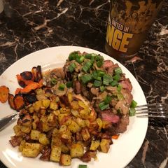 A picture of Saucey Steaker w/ Potatoes & Carrots.