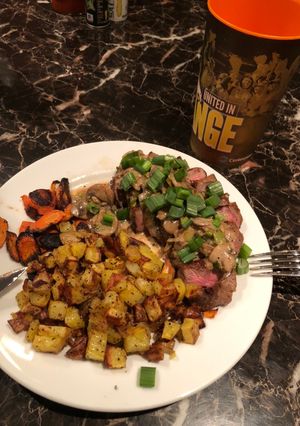 A picture of Saucey Steaker w/ Potatoes & Carrots.