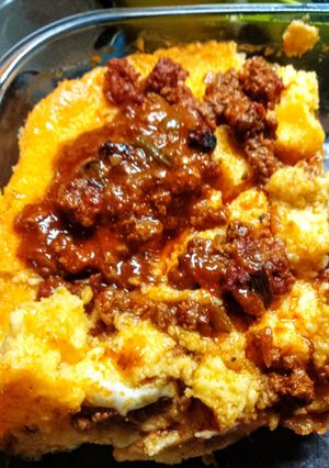 Una foto de Polenta rellena con jamón y queso