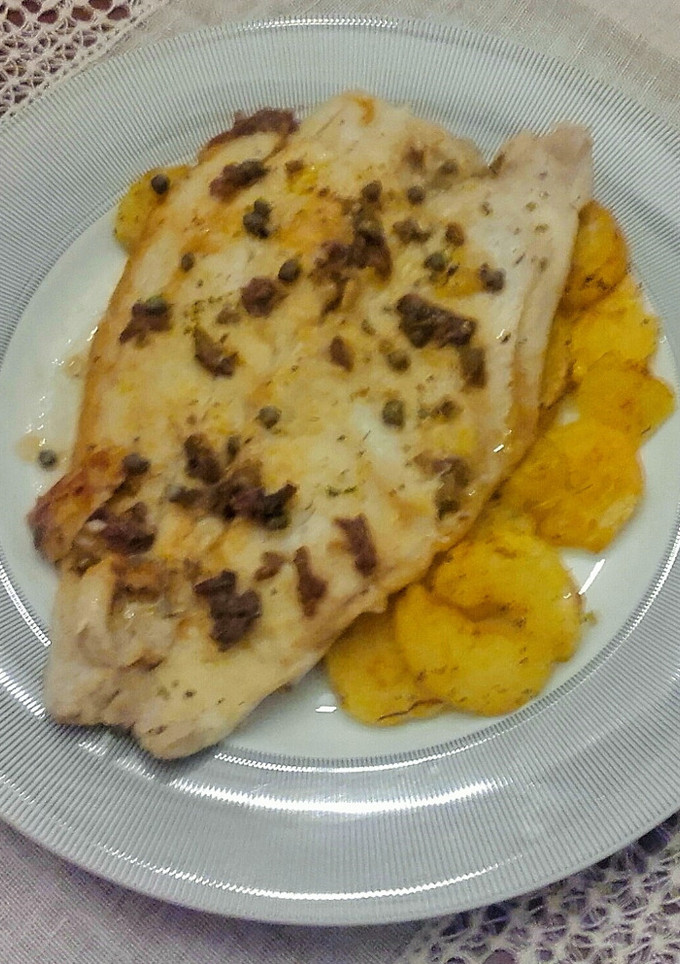 Una foto de Filete de pescado a la sartén con papas