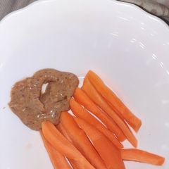 A picture of Carrot + Peanut butter snack.