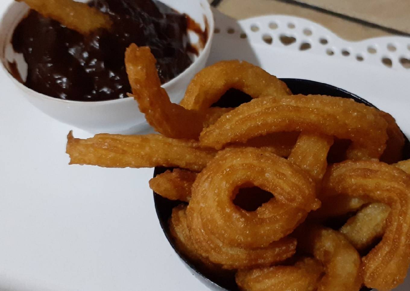 Churros and pasta or chocolate