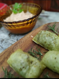 Una foto de Ravioles de acelga y queso