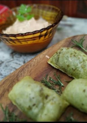 Una foto de Ravioles de acelga y queso