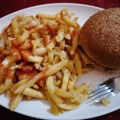 A picture of French fries and burger.