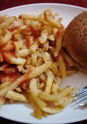 A picture of French fries and burger.