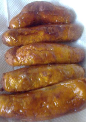 A picture of Spicy beef sausage and a simple sandwich.