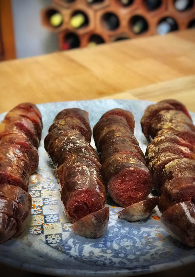 Una foto de Chorizos al Albariño