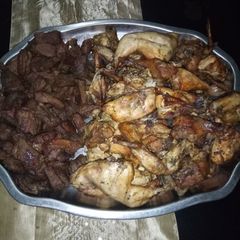 A picture of Grilled chicken and beef.