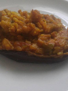 Una foto de Berenjena rellena vegana