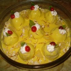 A picture of Pineapple stuffed pineapple ball payasum.