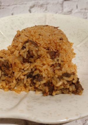 A picture of Fried beef jollof rice.