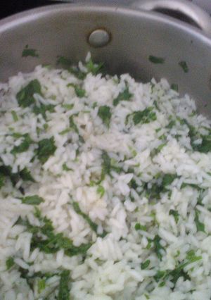 Una foto de Arroz con coco y cilantro