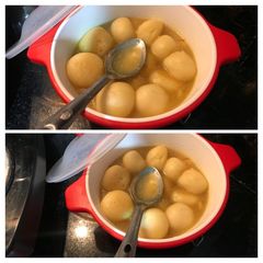A picture of Kolkata Sponge Rasgulla (Speciality: KOMOLA BHOG).