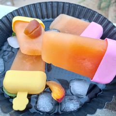 A picture of Peach Popsicles 🍑.