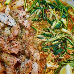 A picture of Spicy Zoodles with Lemon Chicken.