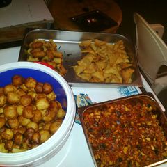 A picture of Spring roll,samosa,Gizdodo, and Nigeria puff puff.