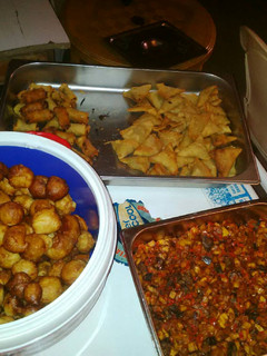 A picture of Spring roll,samosa,Gizdodo, and Nigeria puff puff.