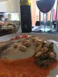 Trancio di spada in salsa di peperone e carciofo