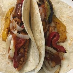 A picture of Grilled chicken fajitas.