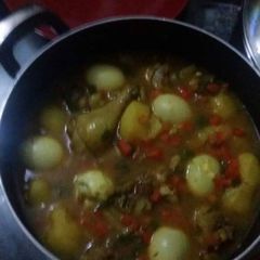 A picture of Chicken sauce with eggs.
