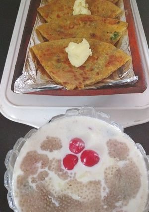 A picture of Club Stuffed Parathas with Sprouts Chia Seeds Raita.