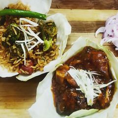 Veg Fried Rice With Chilli Chicken A picture of Veg Fried Rice With Chilli Chicken.