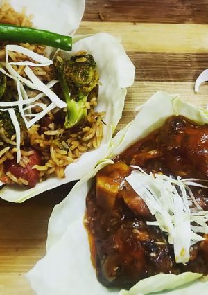 A picture of Veg Fried Rice With Chilli Chicken.