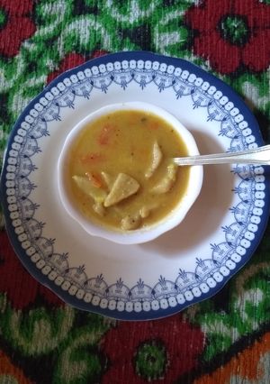 A picture of गुजराती डिश - दाल- ढोकली.