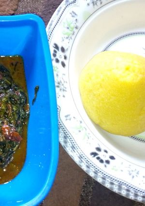 A picture of Eba with vegetable soup.