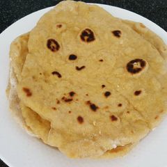 A picture of Flat bread / roti with sourdough starter and carrot.