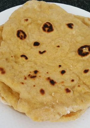 A picture of Flat bread / roti with sourdough starter and carrot.