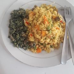 A picture of FriedCouscous with spinach salad.