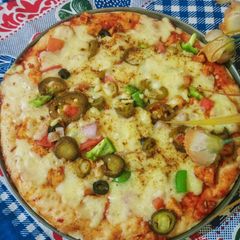 Chicken tandoori pizza 🍕(without oven) A picture of Chicken tandoori pizza 🍕(without oven).