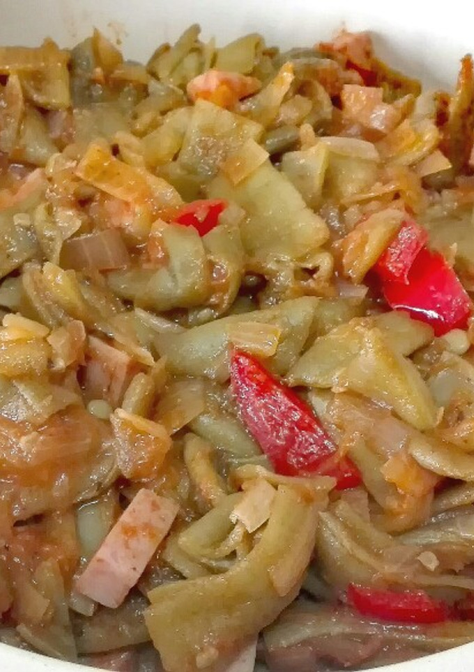Una foto de Judías verdes encebolladas con pimiento rojo