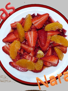 Una foto de Fresas y naranjas