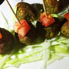 A picture of Hole Red lentil and green gram hole balls with avocado twist.