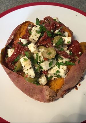 A picture of Baked and stuffed sweet potato.