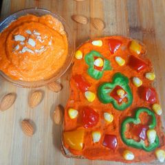 A picture of Open Sandwich with Almond Spread.