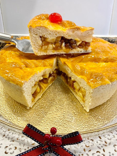 Una foto de Pastel relleno con manzanas y pasas al Moscatel