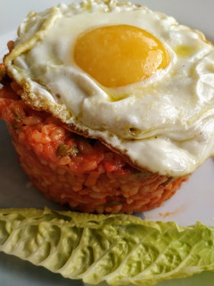 Una foto de Timbal de arroz de la huerta