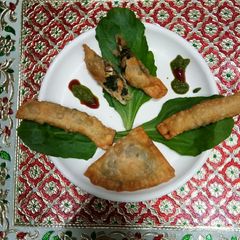 A picture of Spinach cheesey stick and packets.