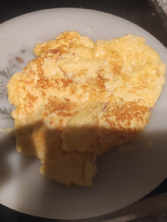 Una foto de Tortilla de queso rallado