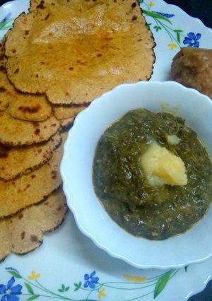 A picture of Sarson Ka Saag and Makki Di Roti.
